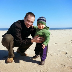 Odin and Daddy on Beach Smile